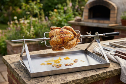 Prime rotisserie spit with roast chicken and natural pan juices